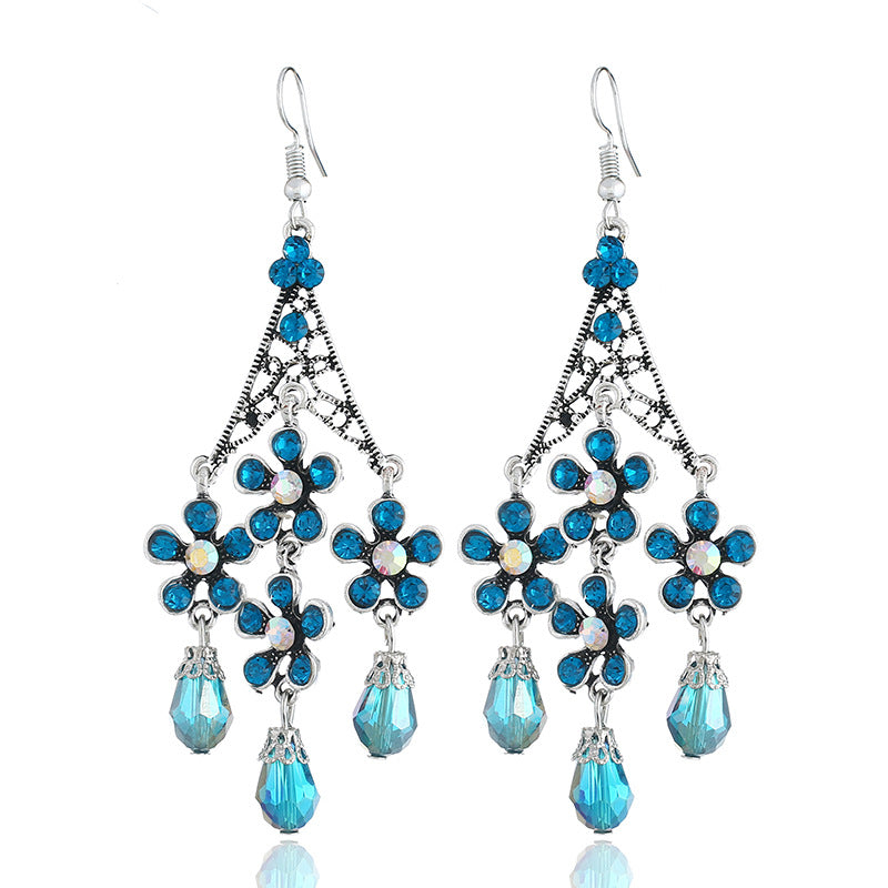 Wholesale Bohemian Retro Tassel Exaggerated Hollow Long Floral Crystal Earrings